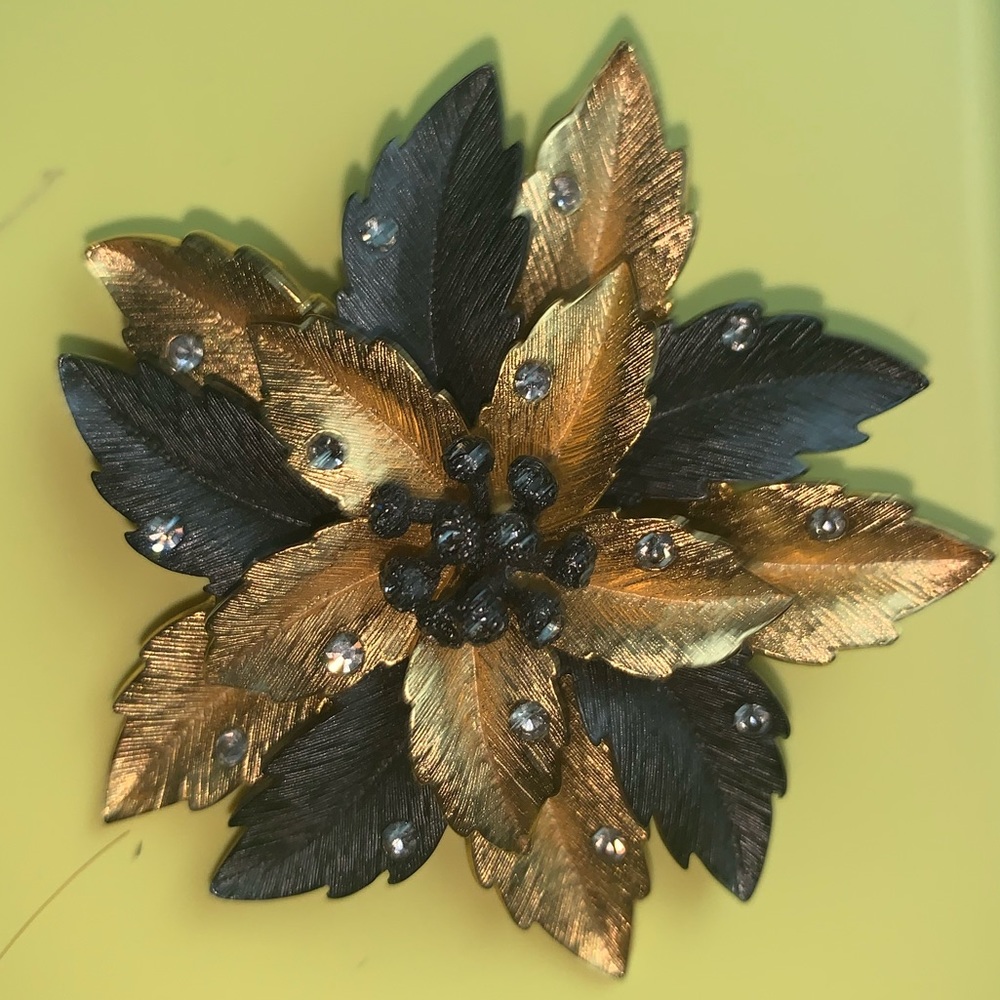 & Joan Rivers black and gold leaf floral brooch with rhinestones.  Good conditio